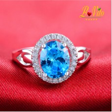 Bague plaquée argent avec pierres précieuses bleu saphir et taille variable   